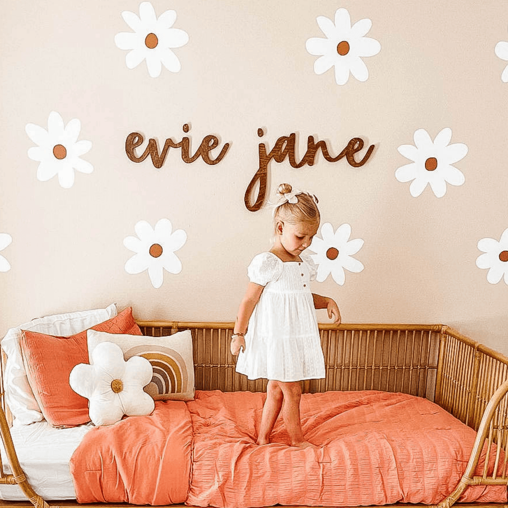 Custom name sign for girls room with baby girl name sign over the bed or crib and nursery name sign with daisy wall decals and boho nursery